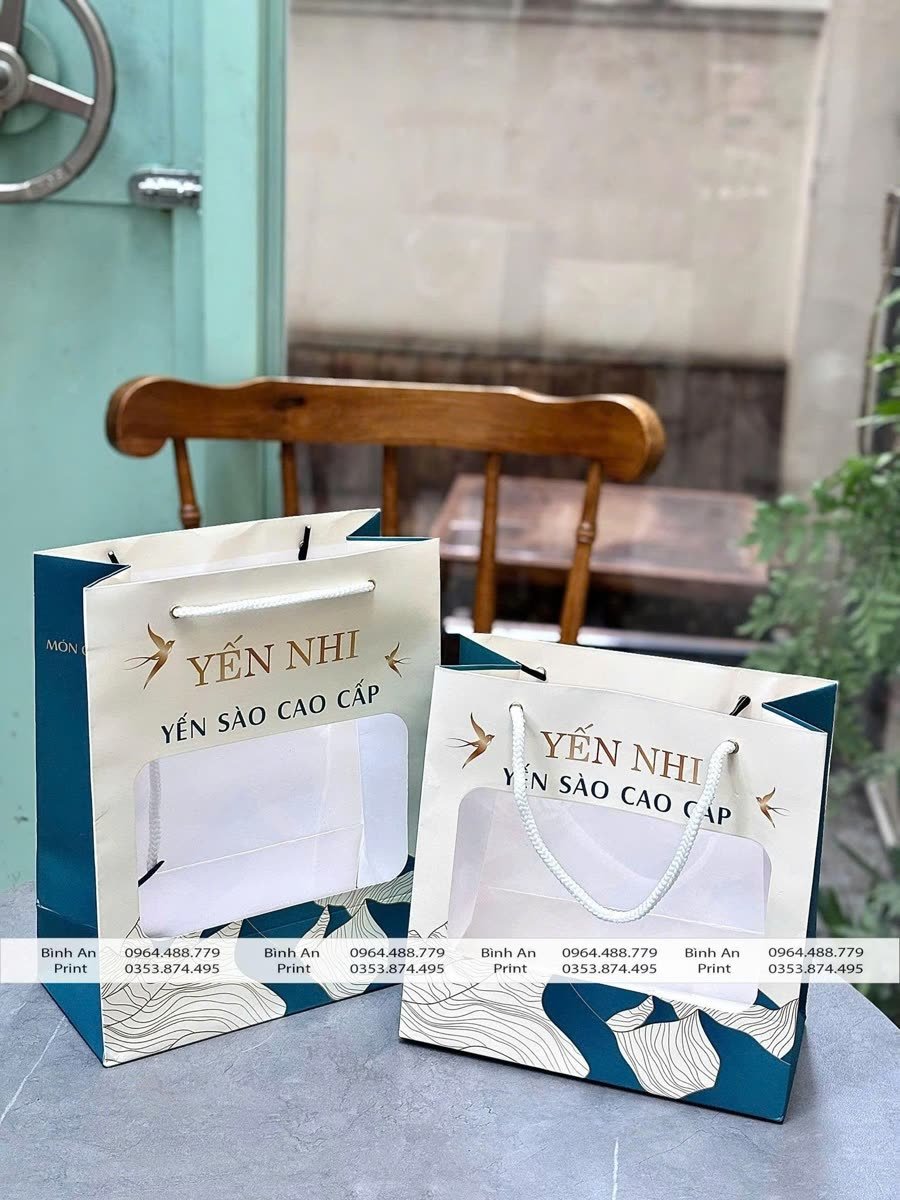 Túi yến chưng, Ivory 230gsm, cán mờ, quai dây xoắn thừng bóng hoặc dây lụa xỏ, do In Bình An in cho Yến Nhi, Yến Chưng Nhà Làm